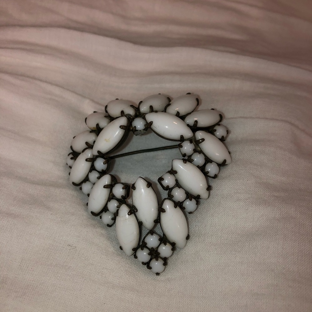 White stone brooch